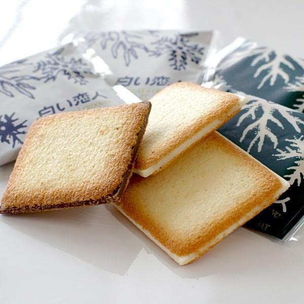 The Ultimate Indulgence: Shiroi Koibito White Lover White & Black Chocolate 24pcs – A Match Made in Cookie Heaven!插图3